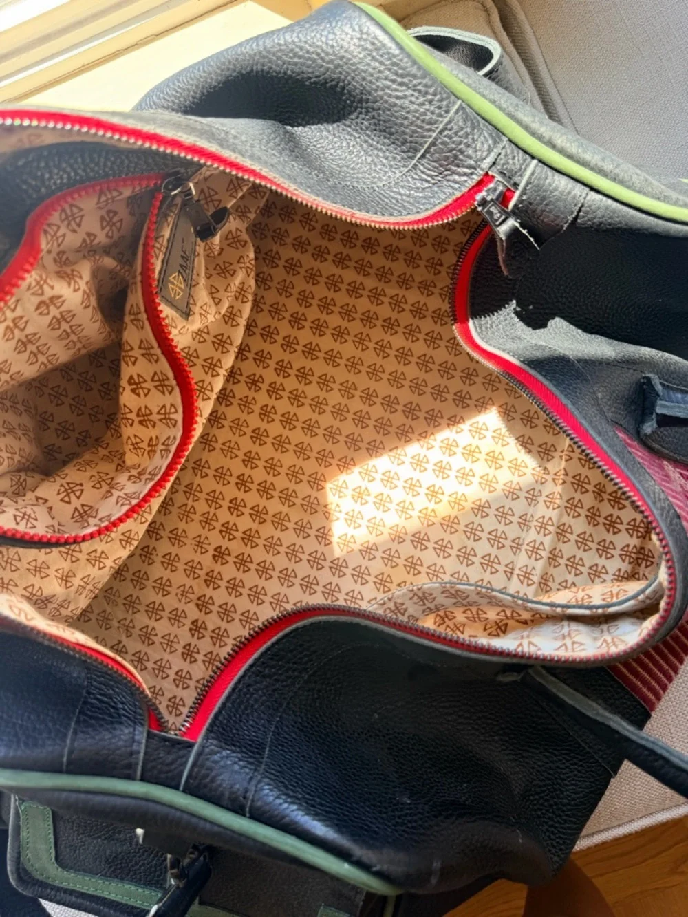 Black Leather Duffel Bag with Red Woven Center Panel